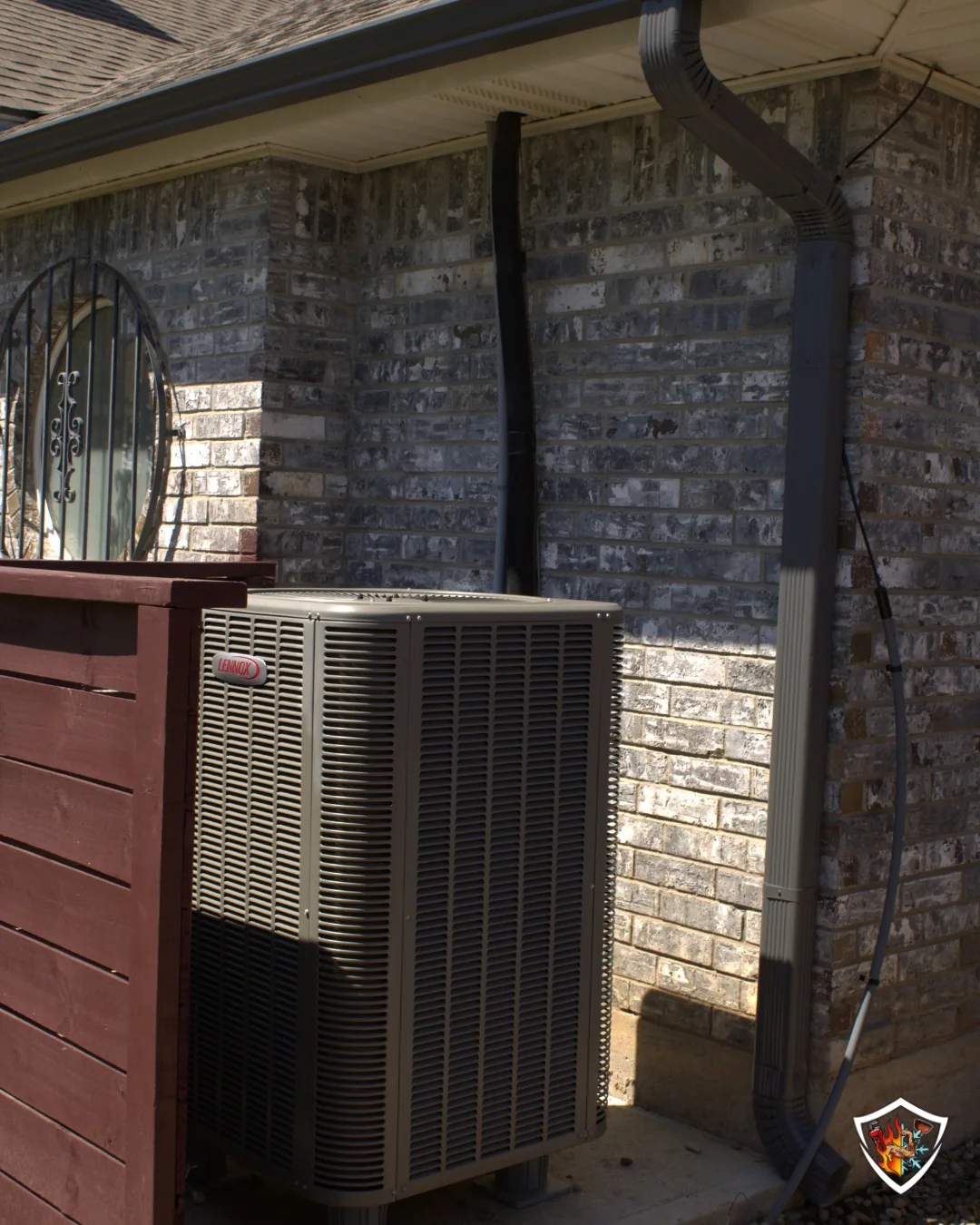 Finished Lennox air conditioner replacement beside an Oklahoma home