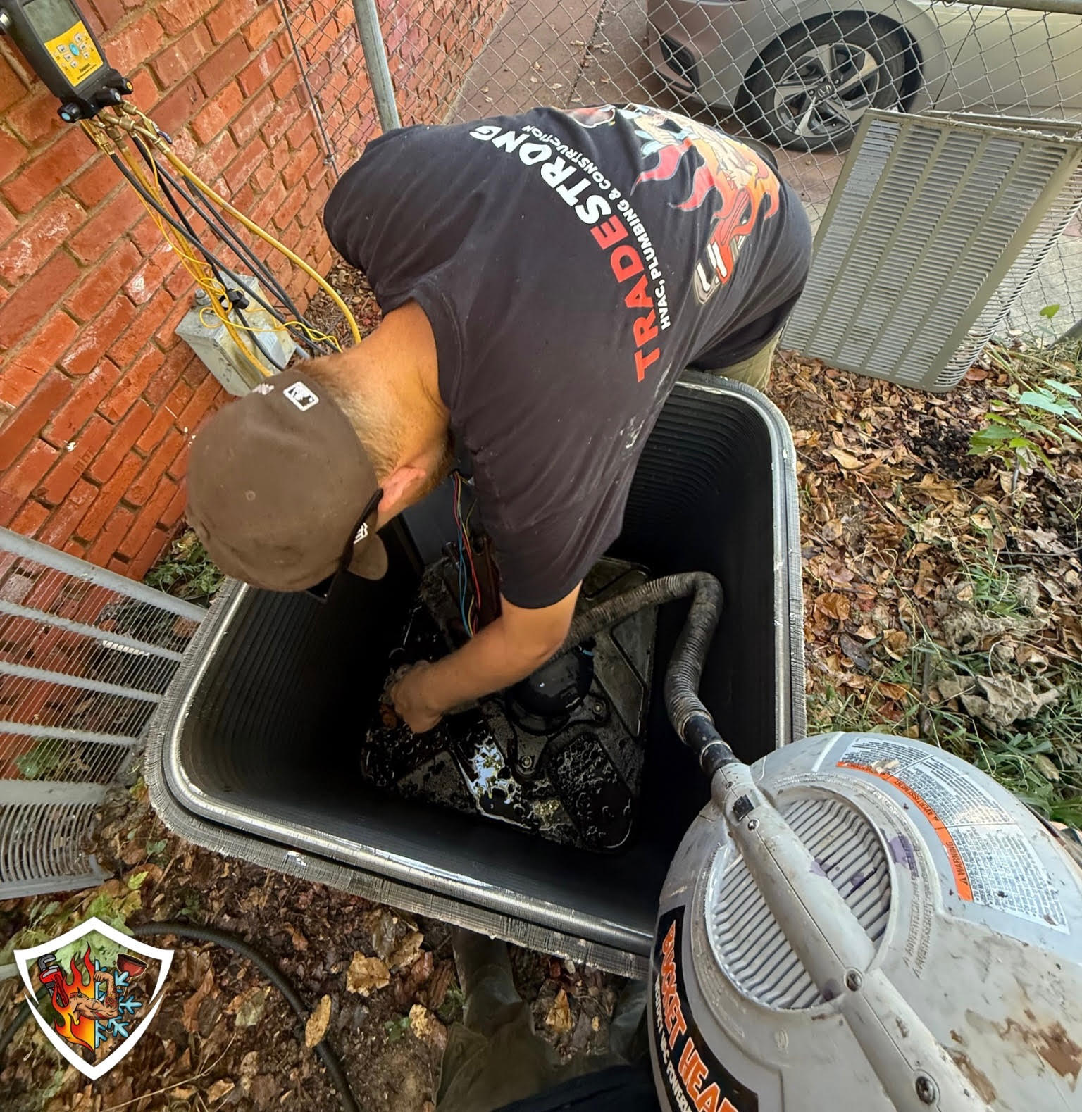 TradeStrong technician servicing an HVAC unit