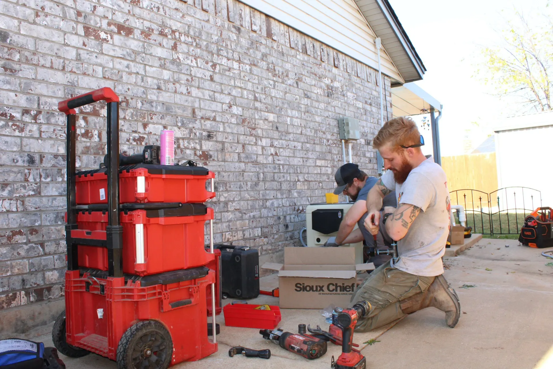 TradeStrong technicians extending a gas line for a Moore pool heater installation