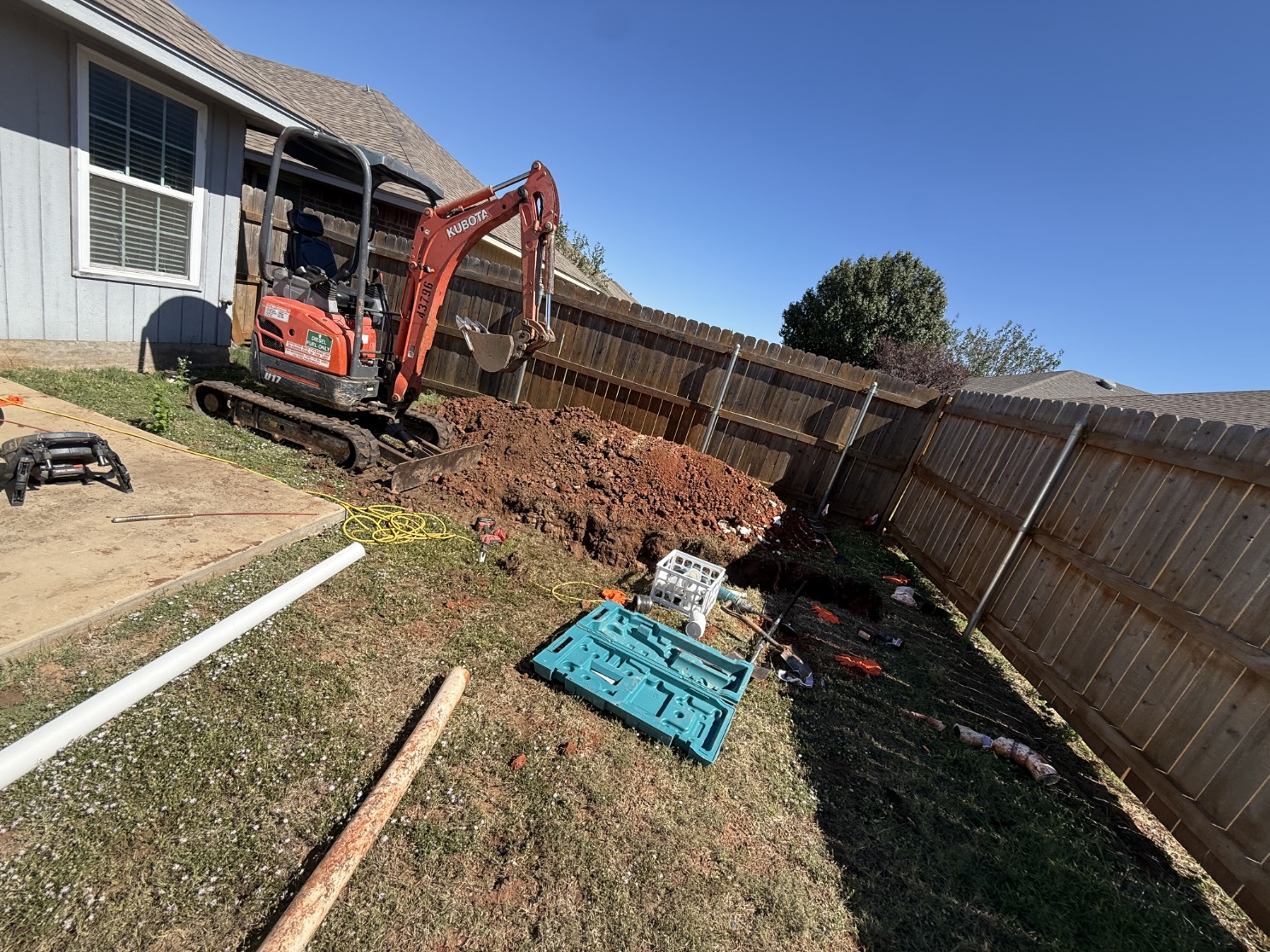 Excavation used to access the affected sewer piping in Edmond.