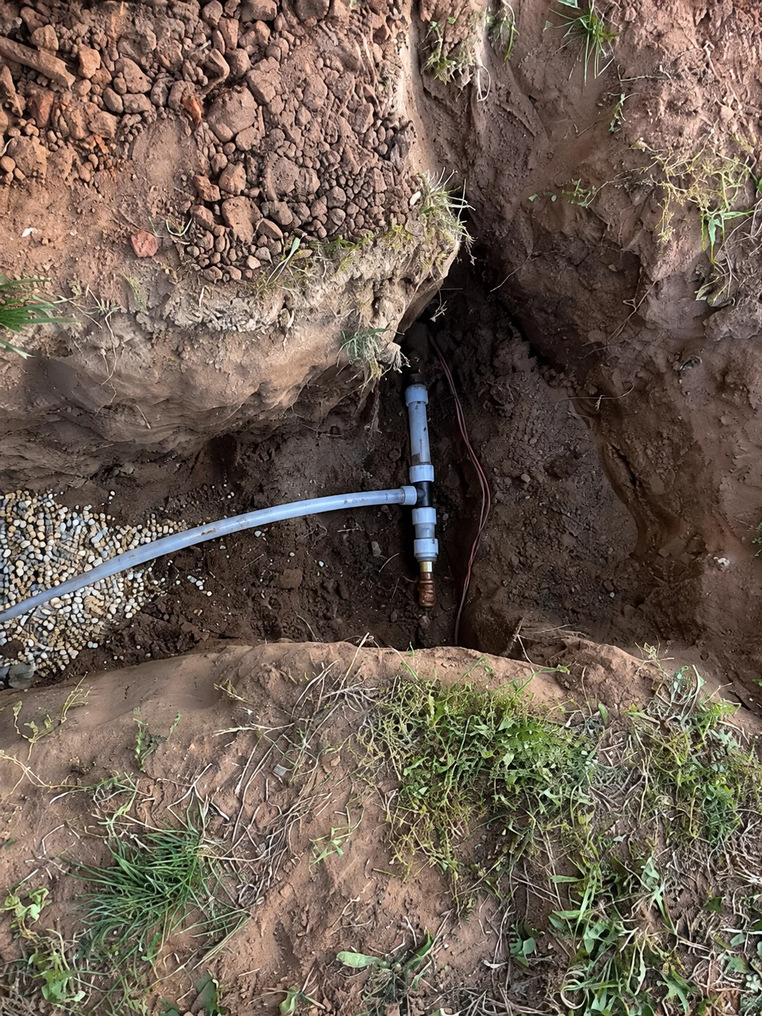 Uponor well-line tie-in with shutoff and drain-down for a seasonal auxiliary bathroom in Harrah Oklahoma